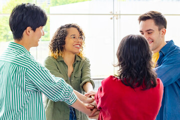 Multinational people making circle in lobby. Teamwork concept.