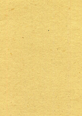 Yellow paper with grainy texture photo background. Old paper surface backdrop.