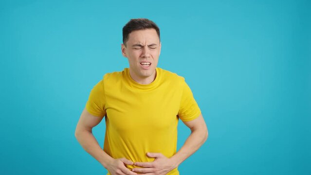 Ill adult man with severe stomach pain