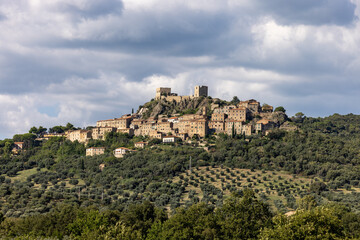 Montemassi a fortified village in the province of Grosseto. Tuscany. Italy - obrazy, fototapety, plakaty
