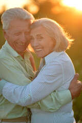 Happy senior couple in love. Park outdoors.