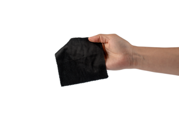 Hand and crumpled microfiber cleaning cloth, isolated on transparent background