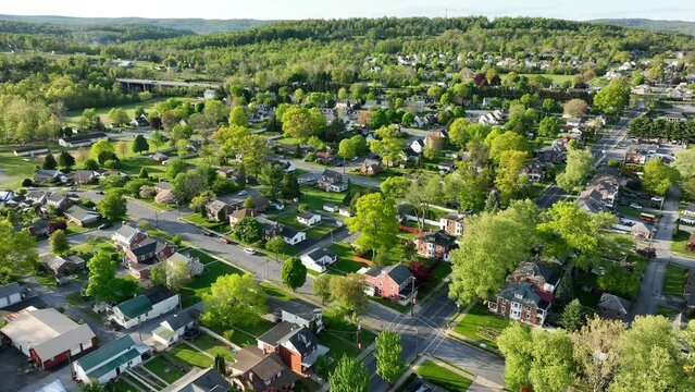 A slow panning cinematic shot of a neighborhood, streets and suburbs in USA.