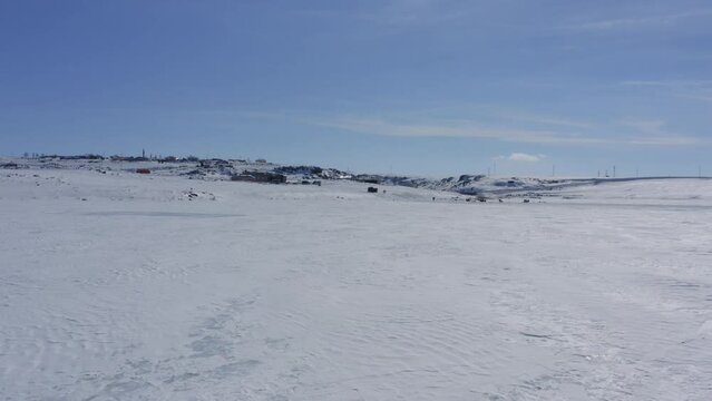 Drone flying over frozen cildir lake in  Kars Turkey close-up