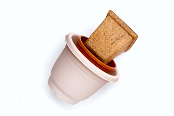 Plastic plant pots, containers on white background.