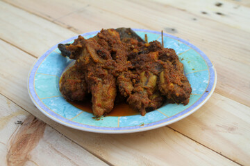 ayam goreng bumbu kuning famous seasoning for fried chicken
