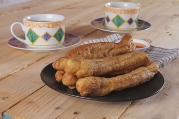 A plate of Cakwe or Cakue. Cakwe is one of the traditional Chinese snacks with a savory taste
