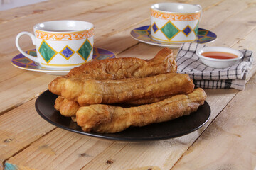 A plate of Cakwe or Cakue. Cakwe is one of the traditional Chinese snacks with a savory taste
