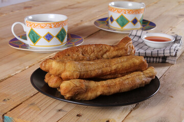 A plate of Cakwe or Cakue. Cakwe is one of the traditional Chinese snacks with a savory taste
