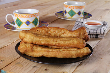 A plate of Cakwe or Cakue. Cakwe is one of the traditional Chinese snacks with a savory taste

