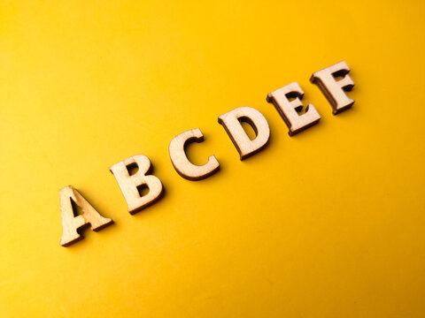 Wooden letter toy arranged the word ABCDEF