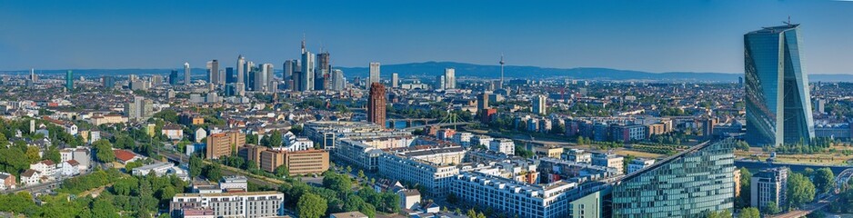 Wide angle drone panorama over the German city Frankfurt am Main during sunrise