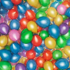 Cheerful multicolour set of glossy balloons. Colourful party decorations.