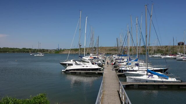 Limanu Marina. Wide angle 4k video with a lot of yachts and ships in the marina bay from Limanu, next to Mangalia, Romania, 2023.