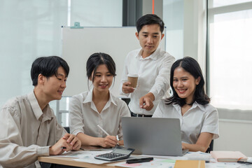 Smiling colleagues gather in boardroom brainstorm discuss financial statistics together, happy coworkers have fun cooperating working together at office meeting, teamwork concept