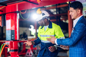 Professional team labor machanic engineer technician worker industrial work control with machine, manufacturing, factory, production line, Indusry 4.0, robot, industrial facility.business planning