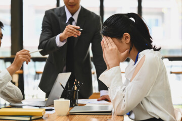 Frustrated intern receiving unfair reprimand rebuke, suffers from bad attitude at work. Emotional...