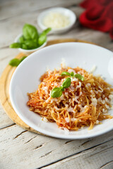 Homemade pasta with tomato and cheese