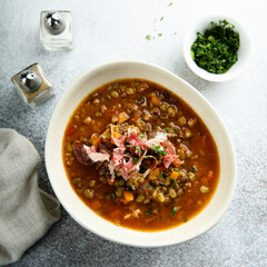 Homemade lentil soup with smoked bacon