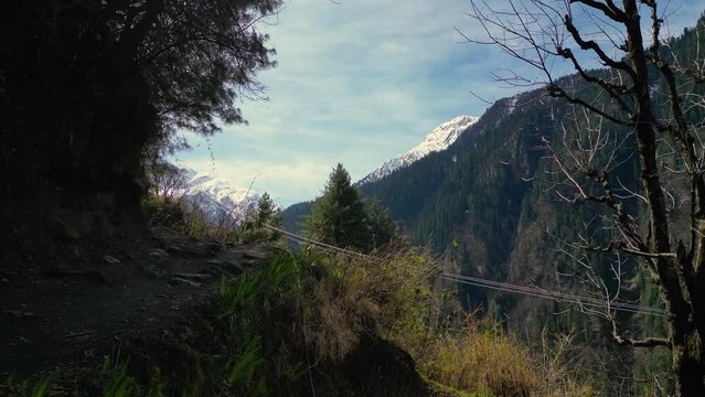 smooth first person view of a trail in the mountains of Indian Himalayas - Kasol, Himachal Pradesh - India