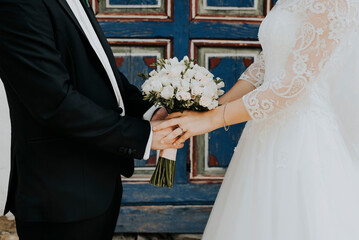 bride and groom with bouquet