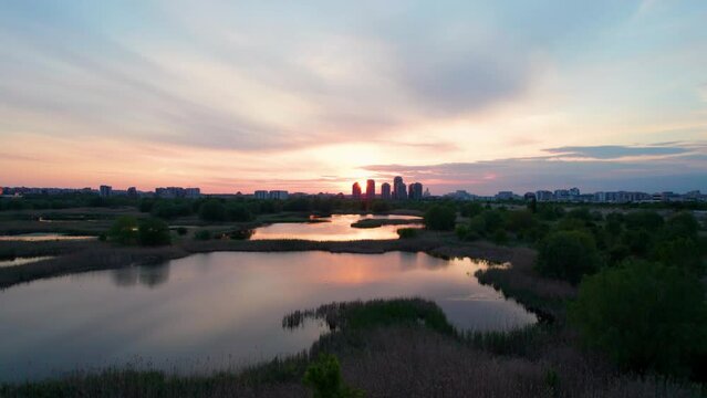 Aerial View Over Delta Vacaresti At Sunset, With Birds Flying, Sunset Colors, Orange, Red, Yellow, Bucharest, Romania