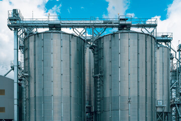 Front view of steel grain storage silos