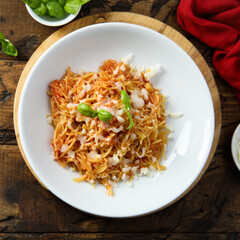 Homemade pasta with tomato and cheese