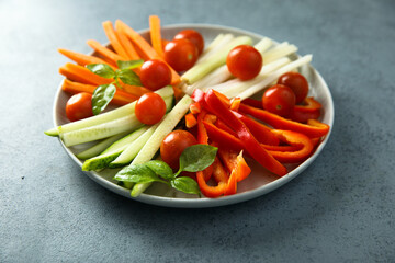 Raw vegetable platter with fresh basil