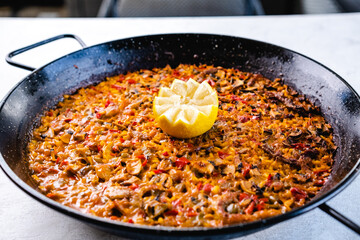 Frying pan with delicious paella