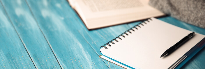 woman hand book with notepad