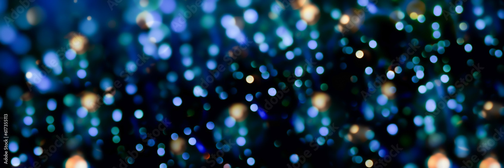 Wall mural abstract blue christmas bokeh light background -festive glowing new year header