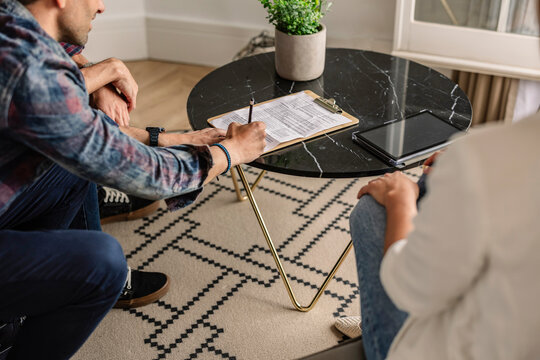 Gay Couple Signing Contract, New Owners, Bank Loans