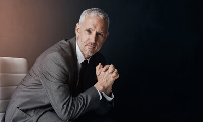 Mockup, chair and portrait of businessman, lawyer or attorney, confidence on dark background and studio space. Boss, ceo and professional business owner, proud senior executive director at law firm.