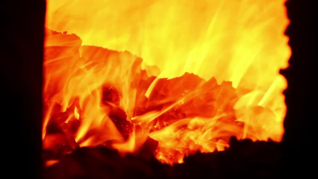 A video of a blazing fire inside the factory kiln during production process