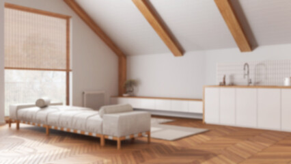 Blurred background, japandi wooden living room and kitchen with sloping ceiling and parquet. Fabric sofa and cabinets. Japandi scandinavian style, attic interior design
