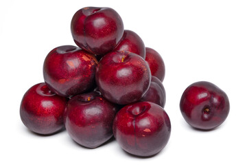 Fototapeta na wymiar Fresh red plums fruit on white background.