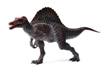 Fototapeta premium spinosaurus toy stands isolated on white background.