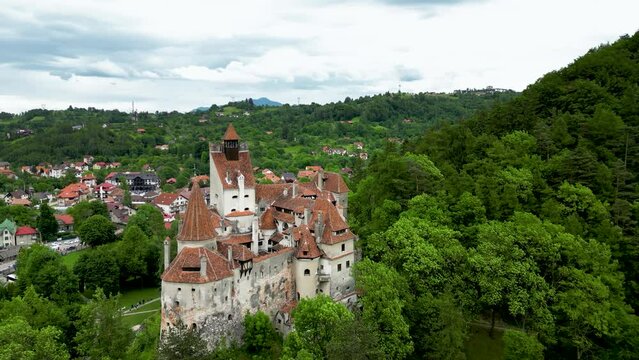 Spectacular footage of Bran Castle. Medieval Castle in Transylvania, Romania. Visited annually by many foreign tourists, one of the best-known tourist attractions. Drone spinning around the castle.
