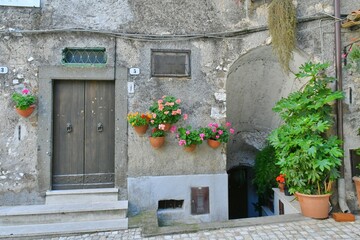 The door of an old house in Artena, a medieval town in the Lazio region, Italy.