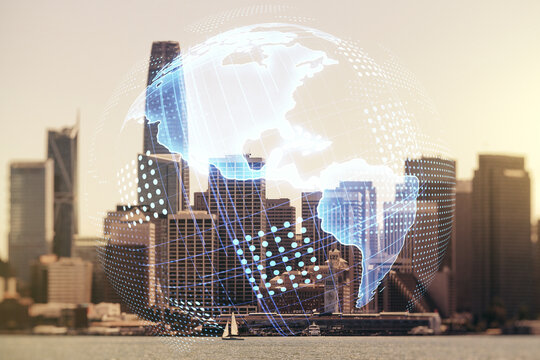 Double exposure of graphic America map hologram on San Francisco office buildings background, big data and digital technology concept