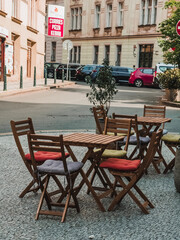 Fototapeta na wymiar Prague, Czech Republic - 05 12 2023: Street cafe in the center of Prague