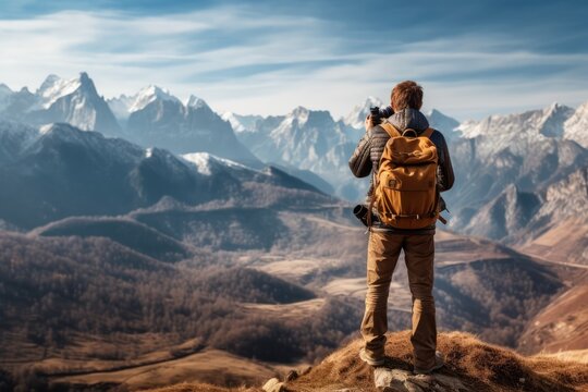 Hiker with backpack taking picture of mountain landscape. Hiking concept
Rear view of hiker photographer taking photographs to a breathtaking panorama. generative AI