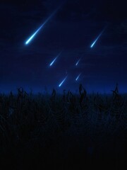 Falling meteorites over the night field. Fireballs in the sky, dreamy landscape. Beautiful meteor shower.