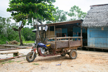 Fototapeta na wymiar Motorcycle transports of a jungle region in the Peruvian Amazon located near the city of Cuipari.