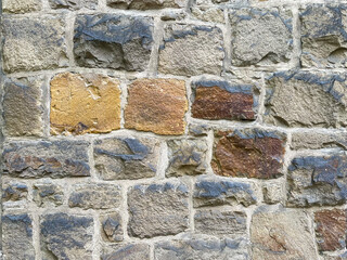 Close Up Stone Wall Texture with big bricks on ancient historic church in Germany, Europe