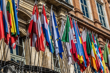 Row of international flags on the university for language, Prugia Italy