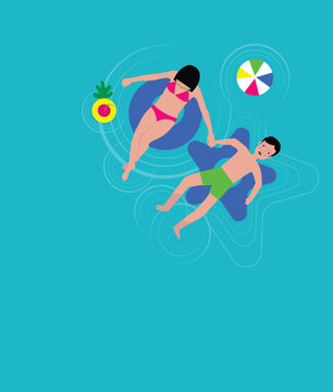 Areal View of Couple Floating in Pool, Relaxing on Floatable Tubes, Holding Hands
