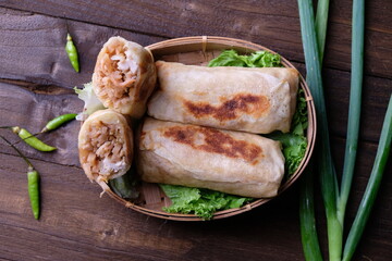 Lumpia Rebung Ayam. bamboo shoot spring rolls with shredded chicken. typical food of Semarang Indonesia. made from sliced bamboo shoots, eggs, shredded chicken, and spices. Indonesian food.