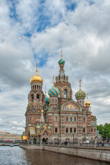 Fototapeta na wymiar photo from the street over the river over Church of the Savior on Blood in St Petersburg, Russia